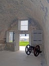 Old cannon inside an old fort room Royalty Free Stock Photo