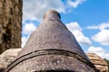 Old cannon muzzle pointed to the blue sky at Koknese Castle