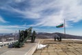 Old cannon of peak Shipka and bulgarian flag Royalty Free Stock Photo