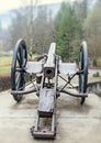 Old cannon with wheels, outdoor close up
