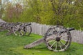 Old cannons with fortified stockade wooden defense wall