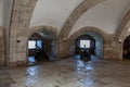 Old Cannons near openings inside Belem Tower on the Tagus River in Lisbon, Portugal Royalty Free Stock Photo