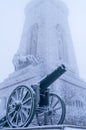 Old cannons.  Winter fog, lots of snow, old cannons covered with snow Royalty Free Stock Photo