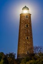 Old Cape Henry Lighthouse with moon Royalty Free Stock Photo