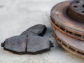 Old car brake pads with brake discs at shallow depth of field Royalty Free Stock Photo