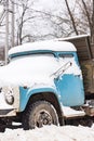 Old car covered with snow Royalty Free Stock Photo
