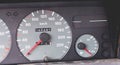 Old car dashboard of the 90`s with speedometer, tachometer... Royalty Free Stock Photo