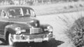 Old Car Drives Up (Archival 1940s)