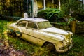 Old car in front of a house in Harpers Ferry, West Virginia. Royalty Free Stock Photo