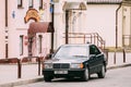 Old car 1996 Mercedes-Benz 190 E (W201) sedan parking on street. First compact executive car from Mercedes-Benz