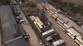 Old Car Metal Scrap Yard with excavator Sorting out old Royalty Free Stock Photo