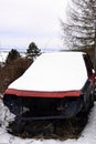 Old car parked near the forest Royalty Free Stock Photo