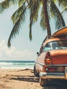 An old car parked on a tropical beach with a canoe on the roof Royalty Free Stock Photo