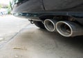 Old Car pipe. Exhaust.Double exhaust pipes of a car Royalty Free Stock Photo