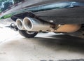 Old Car pipe. Exhaust.Double exhaust pipes of a car Royalty Free Stock Photo