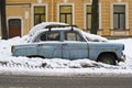 Old car in a snowdrift Royalty Free Stock Photo