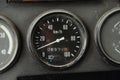 Old car speedometer. Speed indicator background. Parked car zero speed texture. Dashboard of oldschool car. Roration Royalty Free Stock Photo
