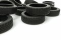 Old car tires on white background