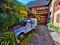 Old car in old town in Elsass in France. Vibrant colors