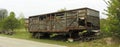 Old car trailer kung in a vacant lot Royalty Free Stock Photo