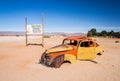 Old car wreck left on the Namib Desert, Namibia. Royalty Free Stock Photo