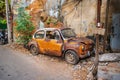 Old car wreck in old alley of talat noi.Talad Noi Talat Noi Royalty Free Stock Photo