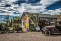 Old car wreck and a store in Hackberry, Arizona Royalty Free Stock Photo