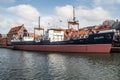 Old cargo museum ship or a steamer Soldek in Old Town of Gdansk in Poland Royalty Free Stock Photo