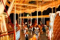 An old carousel with horses and other animals in an amusement park. night time.Merry-go-round with horses. Royalty Free Stock Photo