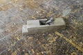 Old carpenter tool planer on vintage wooden background Royalty Free Stock Photo