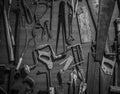 Old carpentry tools on an old workbench in black and white Royalty Free Stock Photo