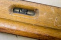 Old carpentry tools in a workshop. Spirit level in a wooden case Royalty Free Stock Photo