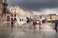 Old carriages in modern Krakow