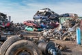 Old cars in landfill. Garbage pile in trash dump or landfill. Pollution concept.