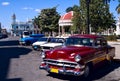 Old cars and rotunda, Cuba Royalty Free Stock Photo