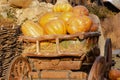 An old cart with a harvest of pumpkins