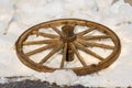 Old cart wheel.