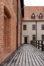 Old carved door to the room in the castle of the Teutonic Knights. Door in the castle museum Royalty Free Stock Photo