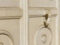 Old palace white wooden door and white metal knocker Royalty Free Stock Photo