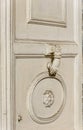 Old palace white wooden door and white metal knocker Royalty Free Stock Photo