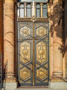 Old carved wooden door with columns, horizontal photo Royalty Free Stock Photo
