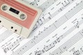 Old cassette tape and music notes Royalty Free Stock Photo