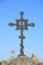 Old cast iron cross ornament Royalty Free Stock Photo