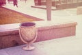 Old cast iron empty trash cans stand in the city Park Royalty Free Stock Photo