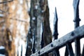 Old cast iron spiked fence in a park Royalty Free Stock Photo