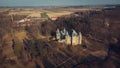 Old castle with a beautiful park in Goluchow, Poland. Historical monument. Travel in Europe. An aerial view drone photo in neutral Royalty Free Stock Photo