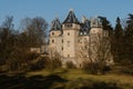 Old castle with a beautiful spring park in Goluchow, Poland. Travel in Europe. Historical monument. Royalty Free Stock Photo