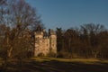 Old castle with a beautiful spring park in Goluchow, Poland. Travel in Europe. Historical monument.