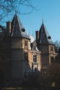 Old castle with a beautiful spring park in Goluchow, Poland. Travel in Europe. Historical monument.