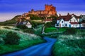 An old castle on the hill at twilight